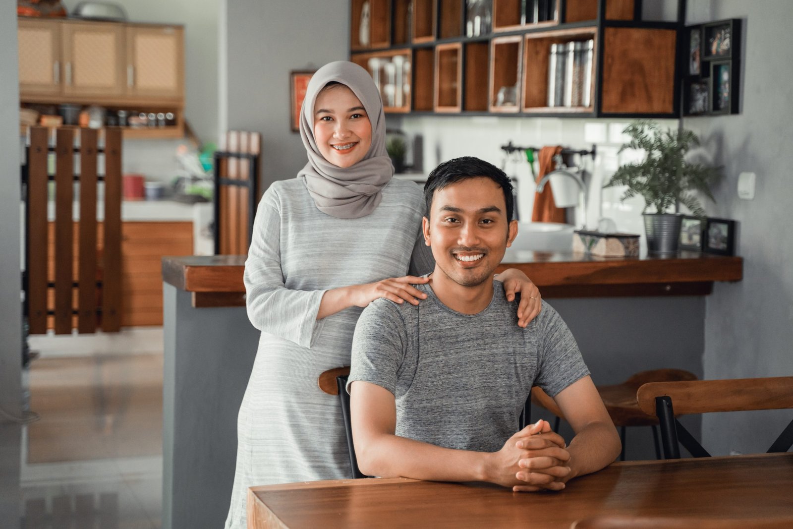 muslim-couple-sitting-dining-room-together-scaled-1.jpg